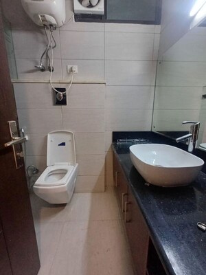 Bathroom in 4 BHK Builder Floor at Nehru Enclave – for Rent