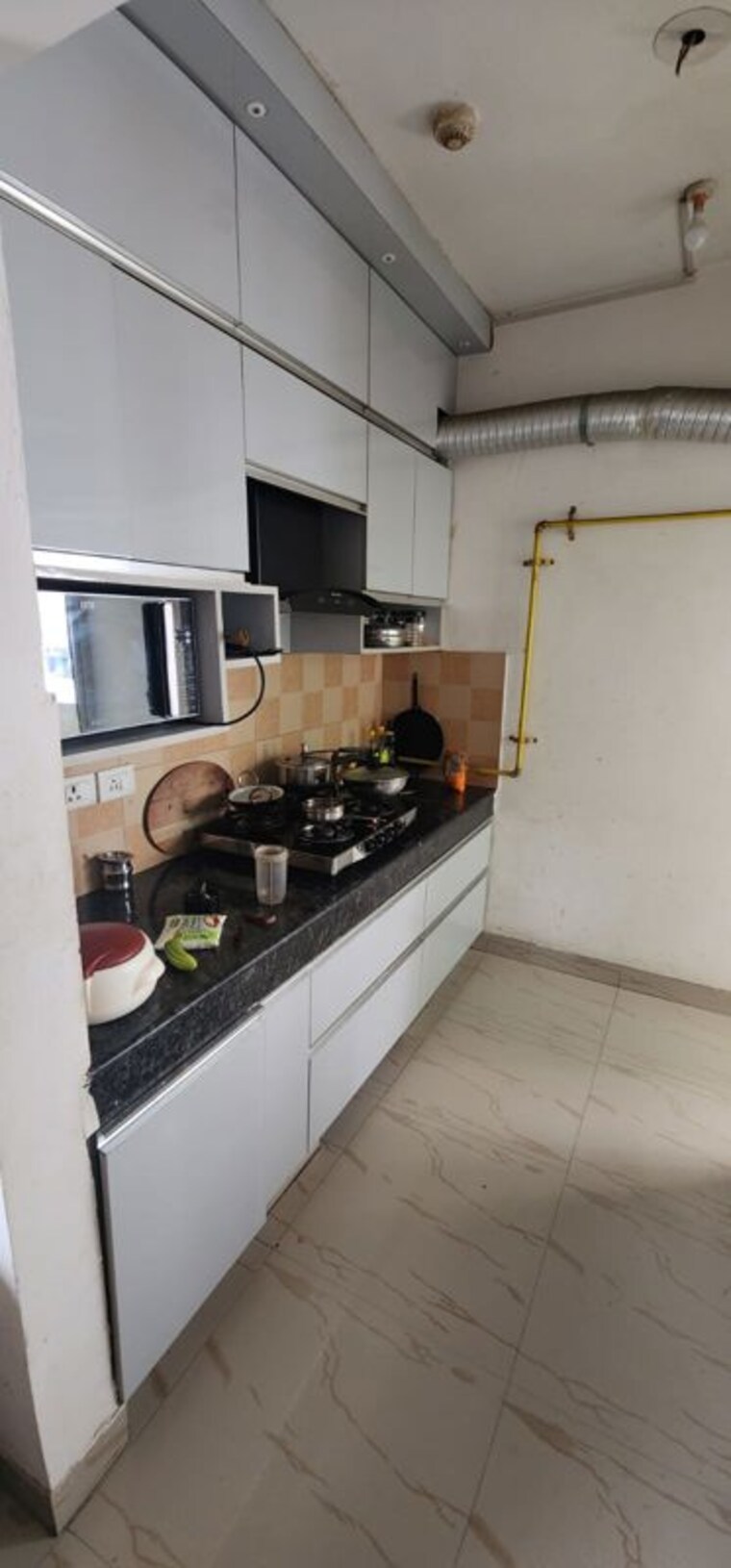 Kitchen, nimbus-the-hyde-park 2 Bedroom 915 Sq.Ft. Apartment In Sector 78 Noida 10600587