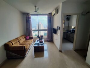 Living Room in 1 BHK Apartment at Hiranandani Estate Solitaire C, Ghodbunder Road – for Rent