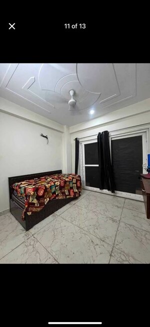 Bedroom in 1.5 BHK Builder Floor at Ansal Plaza Sector-23, Sector 23 – for Rent