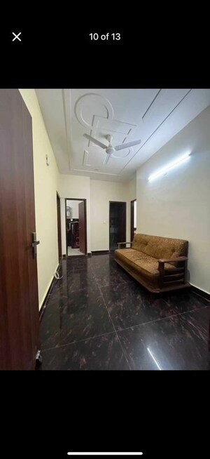 Living Room in 1.5 BHK Builder Floor at Ansal Plaza Sector-23, Sector 23 – for Rent