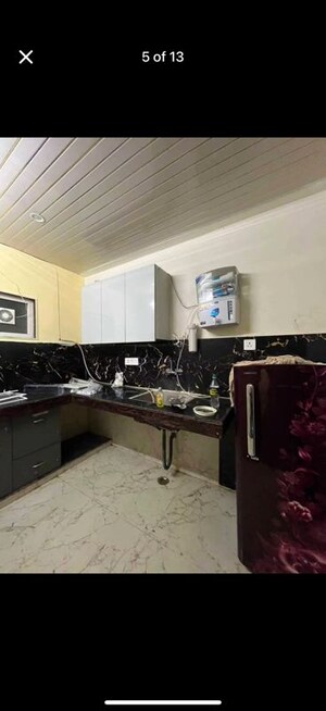 Kitchen in 1.5 BHK Builder Floor at Ansal Plaza Sector-23, Sector 23 – for Rent