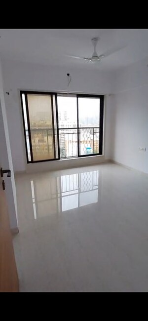 Bedroom in 2 BHK Apartment at Harshail Falcon, Malad West – for Rent