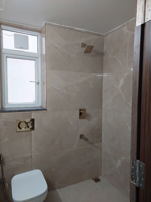 Bathroom in 3 BHK Builder Floor at Smart World Orchard, Sector 61 – for Rent