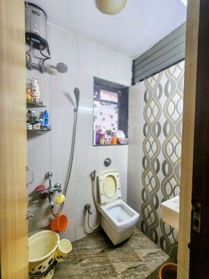 Bathroom in 1.5 BHK Apartment at Manavsthal Heights, Andheri East – for Rent