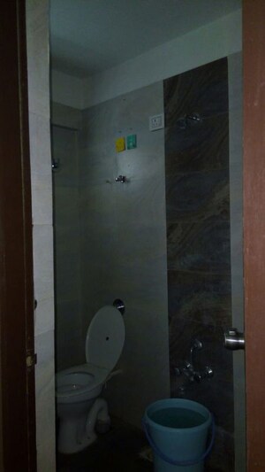 Bathroom in 3 BHK Apartment at Krupal Heritage, Prahlad Nagar – for Rent