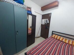 Bedroom in 2 BHK Apartment at Hubtown Harmony, Matunga – for Sale