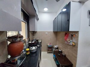 Kitchen in 2 BHK Apartment at Hubtown Harmony, Matunga – for Sale