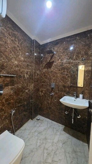 Bathroom in 3 BHK Apartment at Chattarpur – for Rent