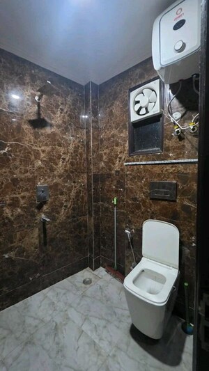 Bathroom in 3 BHK Apartment at Chattarpur – for Rent