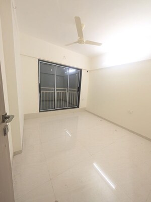 Room in 2 BHK Apartment at Oxford Navrang Crystal, Goregaon West – for Rent