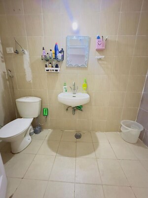 Bathroom in 2 BHK Apartment at Ajnara Grace, Raj Nagar Extension – for Rent