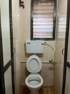 Bathroom in 1 BHK Apartment at Gayatri Corner, Kandivali East – for Rent