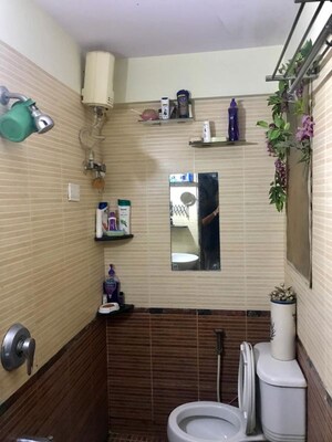 Bathroom in 3 BHK Apartment at RNA NG Suncity Phase III, Kandivali East – for Rent