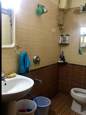 Bathroom in 3 BHK Apartment at RNA NG Suncity Phase III, Kandivali East – for Rent