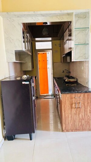 Kitchen in 2 BHK Apartment at Signature Global The Millennia, Sector 37d – for Rent