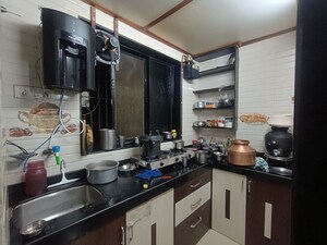 Kitchen in 1 BHK Apartment at Sea Rock Plaza, Kopar Khairane – for Rent