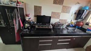 Kitchen in 2 BHK Apartment at Rajveer Palace II, Pimple Saudagar – for Rent