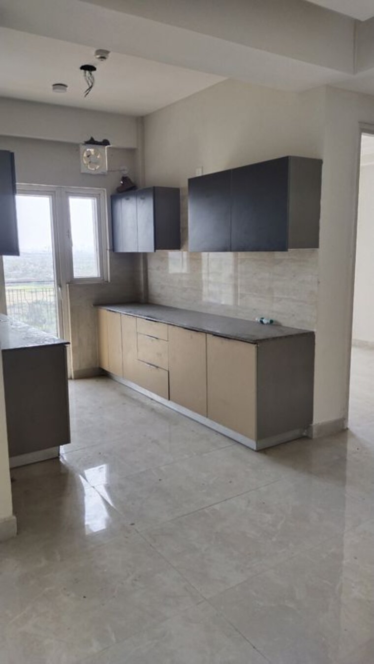 Kitchen, lr-bluemoon-homes 4 Bedroom 1925 Sq.Ft. Apartment In Raj Nagar Extension Ghaziabad 10601226