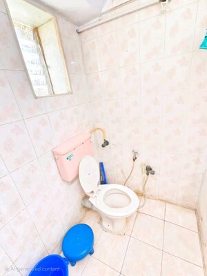 Bathroom in 2 BHK Apartment at Sadguru Sky Heights, Nalasopara West – for Sale