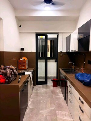 Kitchen in 2 BHK Apartment at Aakash Ganga CHS, Nalasopara West – for Sale
