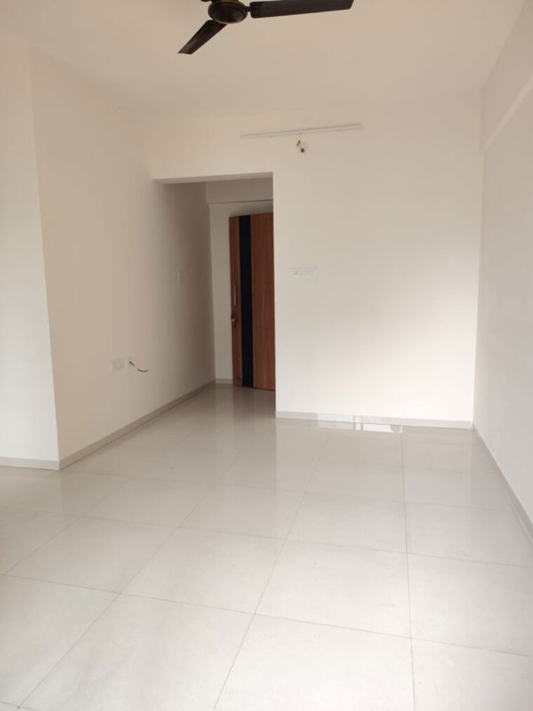 Living Room, nirman-altius 2 Bedroom 894 Sq.Ft. Apartment In Kharadi Pune 10601291