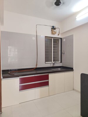 Kitchen in 2 BHK Apartment at Nirman Altius, Kharadi – for Rent