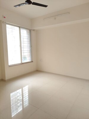 Master Bedroom in 2 BHK Apartment at Nirman Altius, Kharadi – for Rent