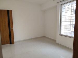 Master Bedroom in 2 BHK Apartment at Nirman Altius, Kharadi – for Rent