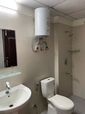 Bathroom in 3 BHK Apartment at Sunworld Vanalika, Sector 107 – for Rent