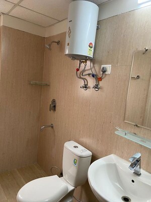 Bathroom in 3 BHK Apartment at Sunworld Vanalika, Sector 107 – for Rent