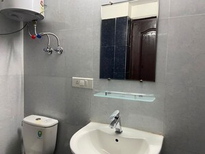 Bathroom in 3 BHK Apartment at Sunworld Vanalika, Sector 107 – for Rent