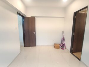 Room in 2 BHK Apartment at Aster Apartment, Borivali West – for Sale