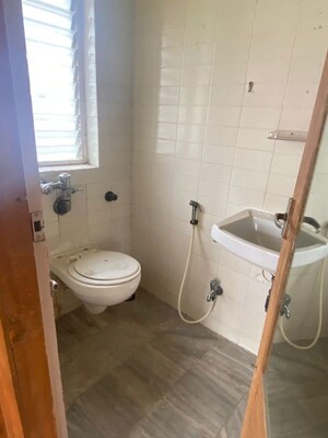 Bathroom in 2 BHK Apartment at Raj Mandir CHS, Andheri West – for Rent