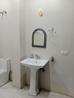 Bathroom in 1.5 BHK Builder Floor at Ansals Sushant City – for Rent