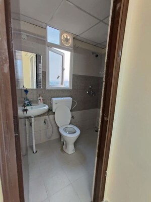 Bathroom in 2 BHK Apartment at Signature Orchard Avenue 2, Sector 93 – for Sale