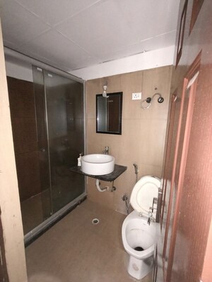 Bathroom in 2 BHK Apartment at Mahagun Maple, Sector 50 – for Sale