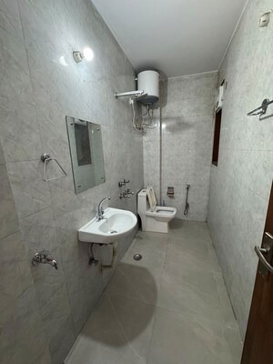 Bathroom in 1 BHK Builder Floor at Palm Residency Chhatarpur, Chattarpur – for Rent