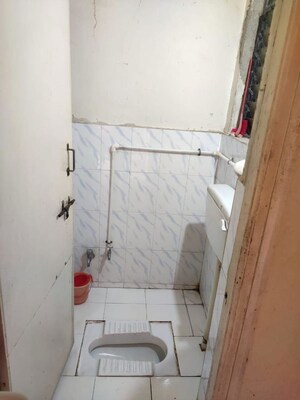 Bathroom in 1 BHK Apartment at Dahanukar Colony – for Sale