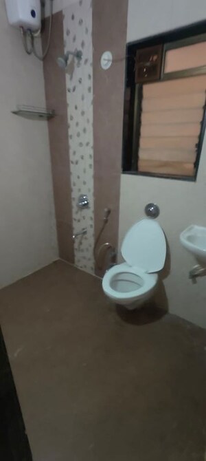Bathroom in 2 BHK Apartment at Crystal Garden Estate CHS, Manpada – for Rent
