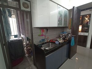 Kitchen in 2 BHK Apartment at Hiranandani Meadows, Manpada – for Rent
