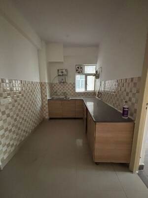 Kitchen in 2.5 BHK Apartment at Gaur City 5th Avenue, Sector 4 Greater Noida – for Sale