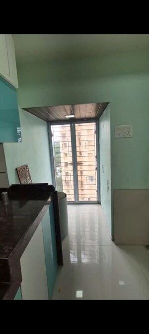 Kitchen in 1 BHK Apartment at Royal Palms, Goregaon East – for Rent