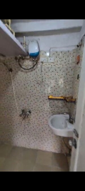 Bathroom in 1 BHK Apartment at Royal Palms, Goregaon East – for Rent