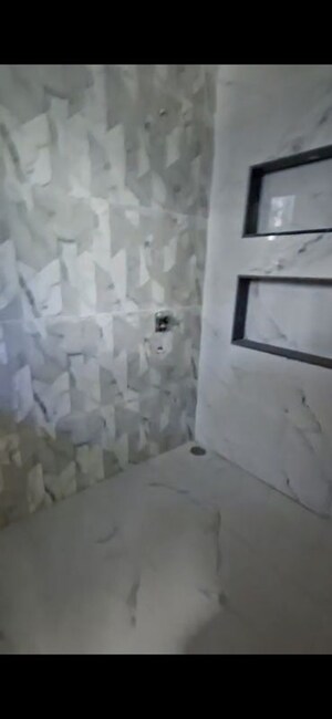 Bathroom in 4 BHK Builder Floor at Sector 85 – for Rent