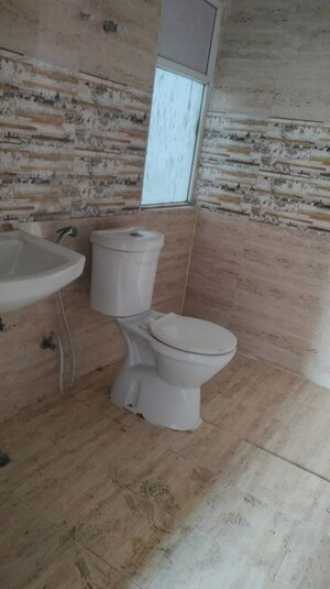 Bathroom in 2.5 BHK Apartment at Amrapali Kingswood, Sector 4 Greater Noida – for Sale