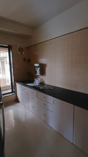Kitchen in 4 BHK Apartment at Neelkanth Heights Shivai Nagar, Shivai Nagar – for Rent