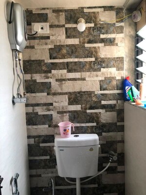 Bathroom in 1 BHK Apartment at Unnathi Woods Phase 1 And 2, Ghodbunder Road – for Sale