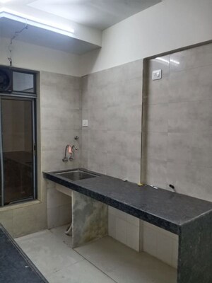 Kitchen in 1 BHK Apartment at Harshail Hornbill, Malad West – for Sale
