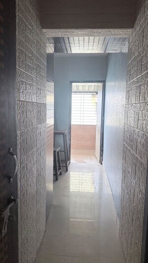 Building Lobby in 2 BHK Apartment at Ravindra Heights, Titwala – for Sale
